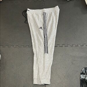 Adidas Gray Sweatpants with Three-Stripe Design